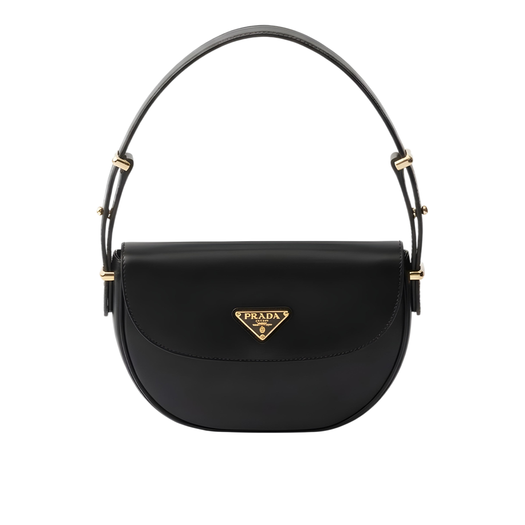 Arqué leather shoulder bag with flap